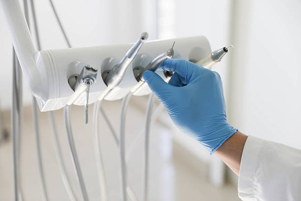 Professional Tooth Extraction technician working in Allegan, MI